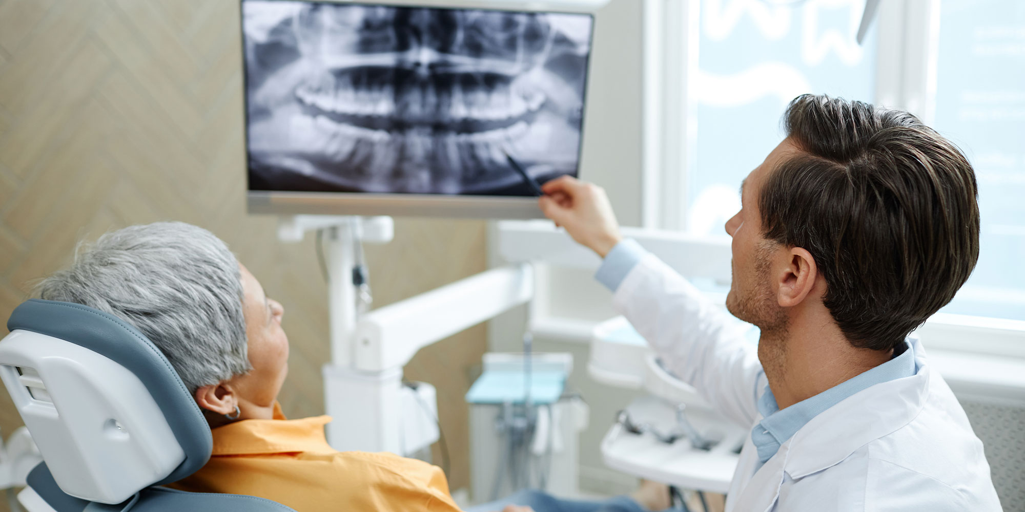 doctor pointing to screen